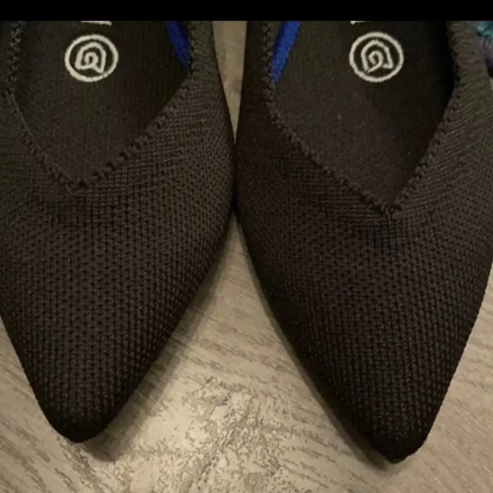 Rothy’s the point point size 12 black retired white halo woman’s flat shoes